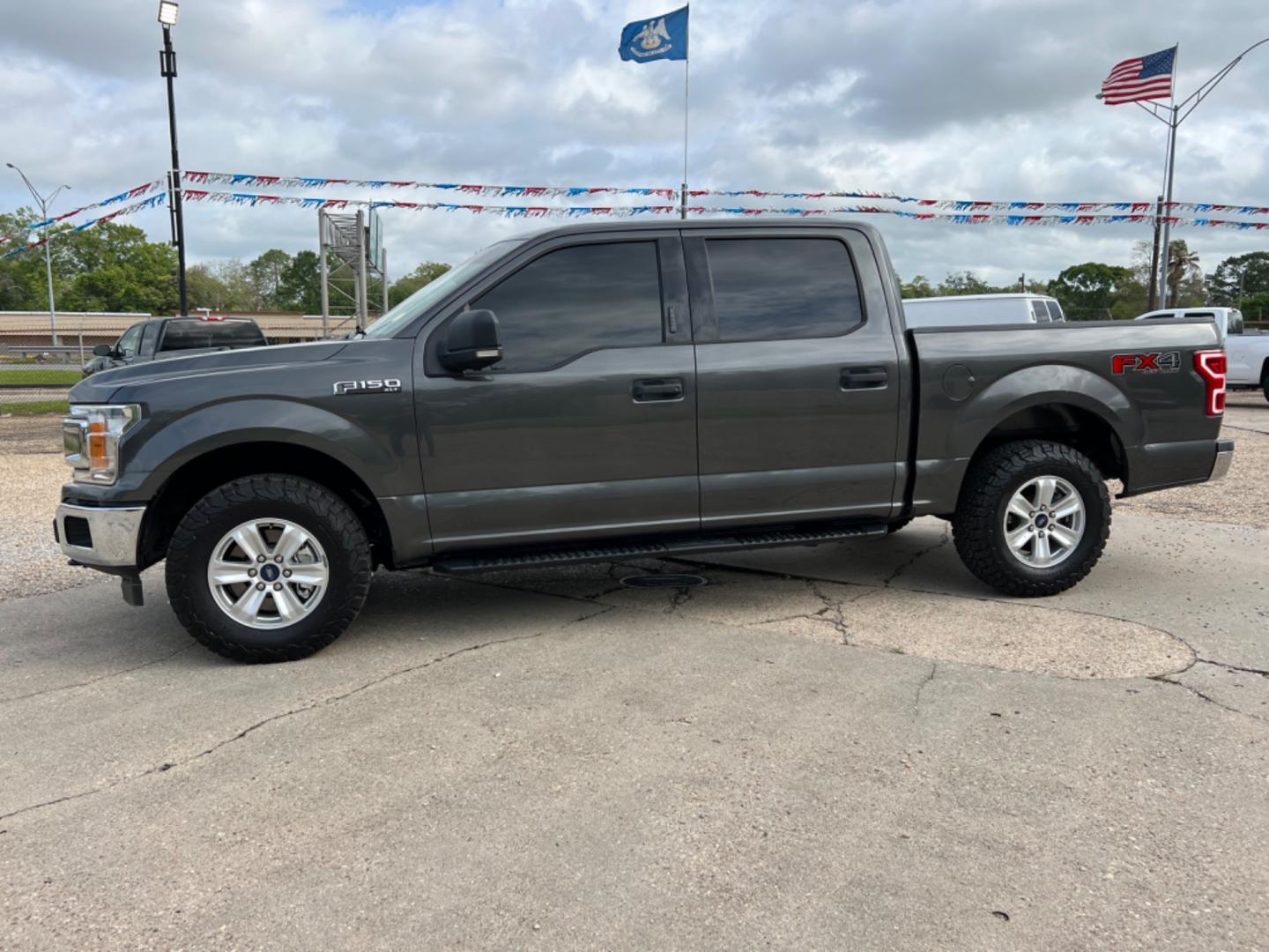 2018 Grey /Grey Ford F-150 XLT (1FTEW1EP5JK) with an 2.7 V6 EcoBoost engine, Automatic transmission, located at 4520 Airline Hwy, Baton Rouge, LA, 70805, (225) 357-1497, 30.509325, -91.145432 - 2018 Ford F150 SuperCrew XLT 4WD ***One Owner & No Accidents*** 2.7 V6 EcoBoost Gas, 135K Miles, Power Windows, Locks & Mirrors, New Tires, Backup Camera, Tow Pkg. FOR INFO PLEASE CONTACT JEFF AT 225 357-1497 CHECK OUT OUR A+ RATING WITH THE BETTER BUSINESS BUREAU WE HAVE BEEN A FAMILY OWNED AND O - Photo#1